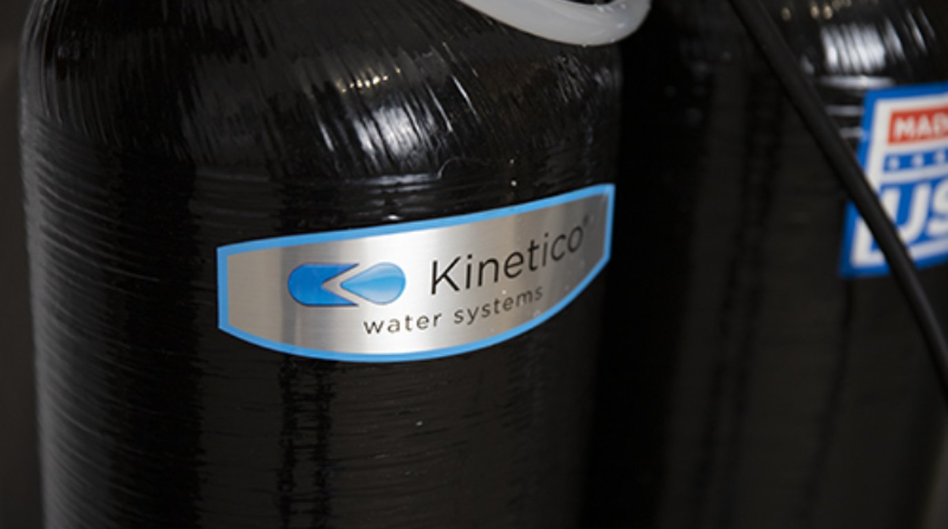 A Kinetico non-electric water softener tank