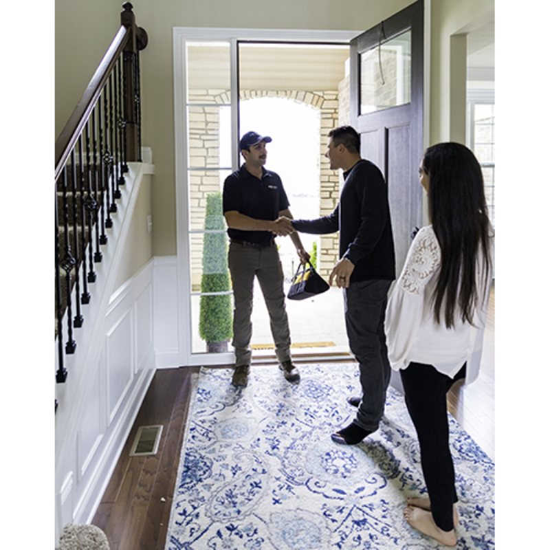 A Cardinal technician arriving at a customer home