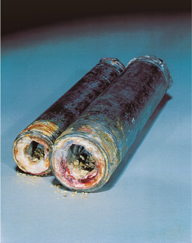 Pipe interior blocked with mineral scale